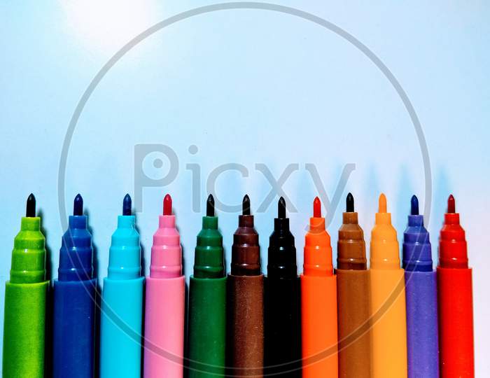 Colourful Sketch Pens Over an isolated White Background