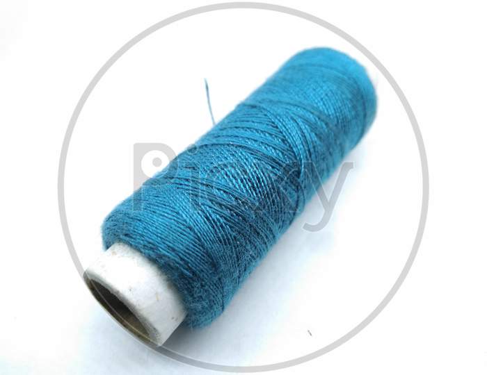 Sewing Thread Roll On Isolated White Background
