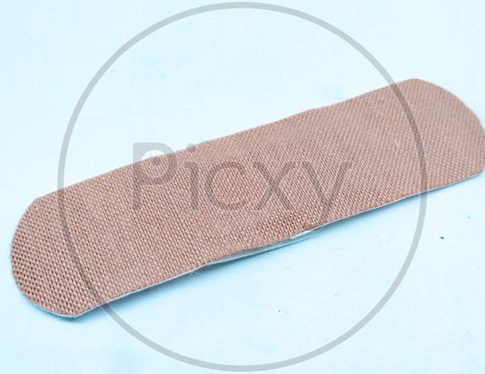 Wound Bandage Closeup Over an Isolated White Background