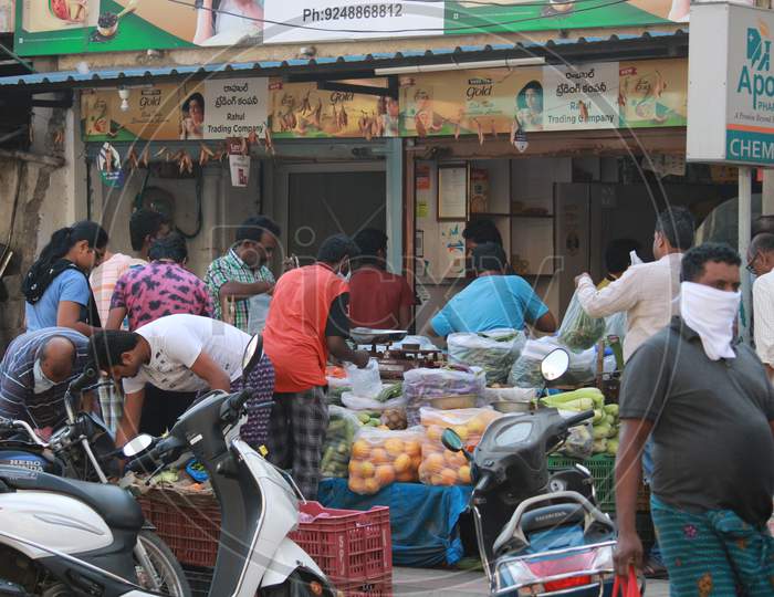 People Wearing Masks At Crowdy Places And At Vegetable And Groceries Stores Amidst Corona Virus Outbreak in India