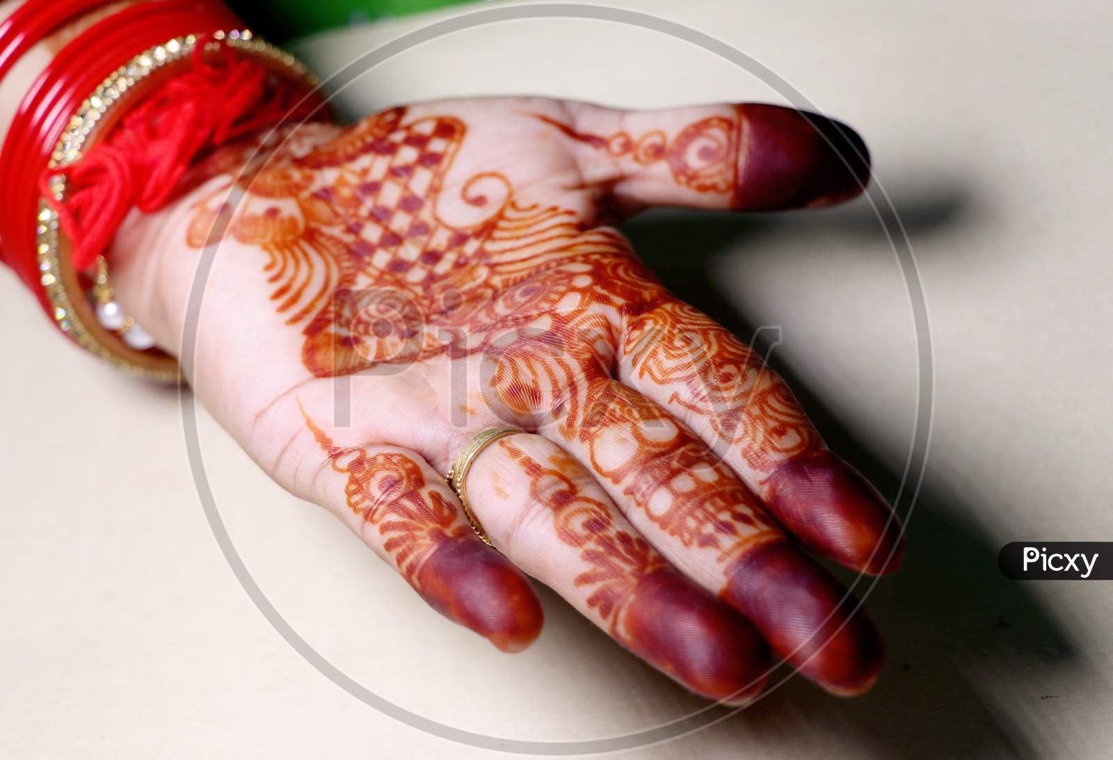 Art In Girls Hand Using Henna Plant Also Called As Mehndi Design,Style.It Is A Tradition In India.