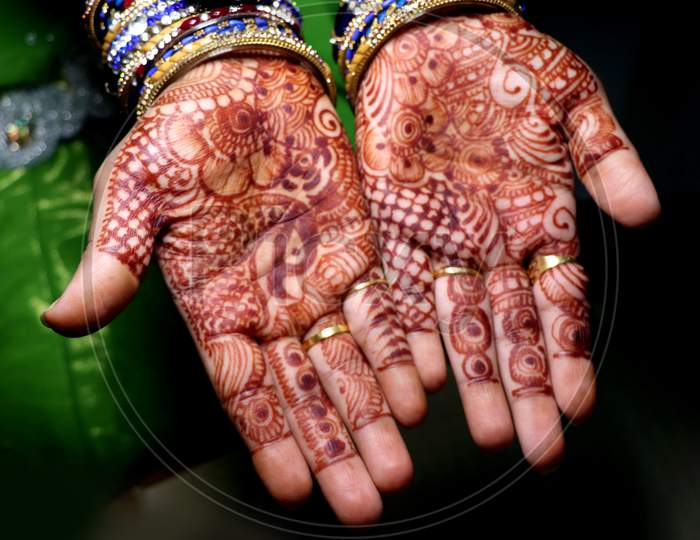 Art In Girls Hand Using Henna Plant Also Called As Mehndi Design,Style.It Is A Tradition In India.