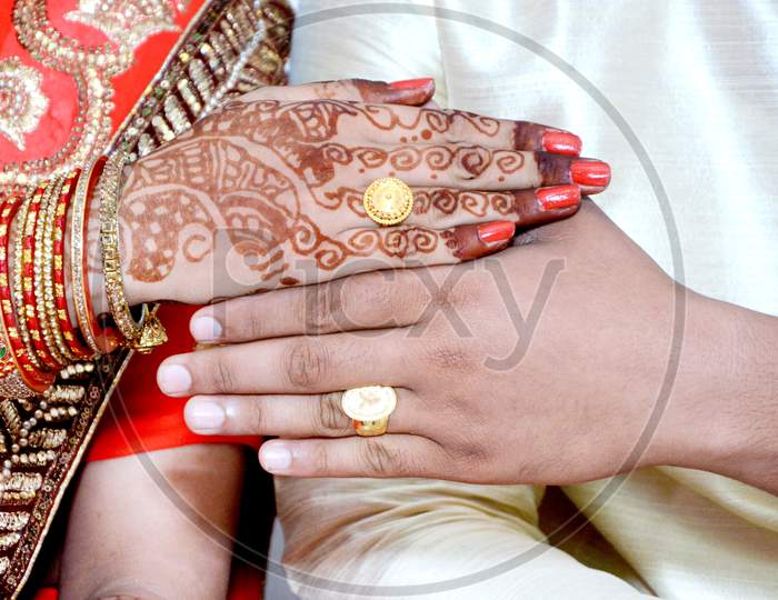 An Indian Bride And Groom Their Shows Engagement Rings During A Hindu Wedding Ritual