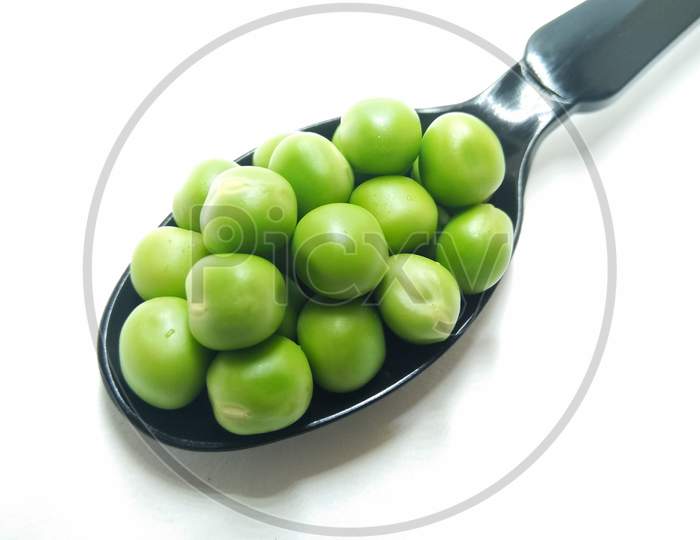 Green Peas On an Isolated White Background