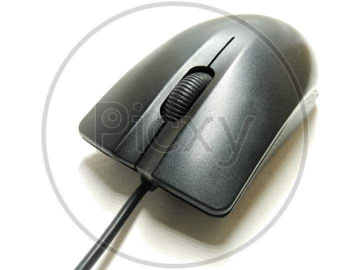 Optical Mouse Of Computer Over an Isolated White Background