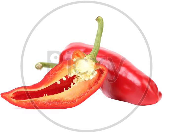 Red Pepper And Slice. Isolated On A White Background.