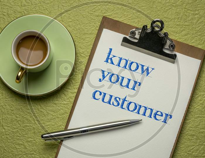 Know Your Customer - Handwriting On A Clipboard With Coffee, Business Marketing And Public Relations Concept