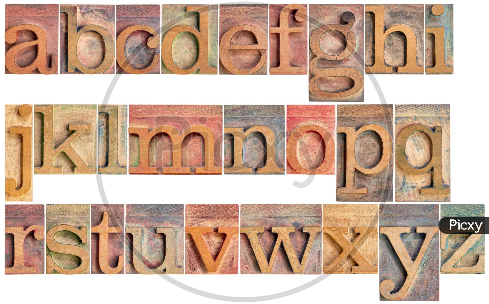 Complete English Lowercase Alphabet - A High Resolution Collage Of 26 Isolated Vintage Wood Letterpress Printing Blocks, Stained By Color Inks