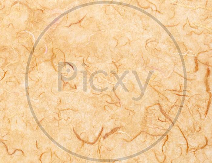 Background Of Light Brown Textured Handmade Mulberry Paper