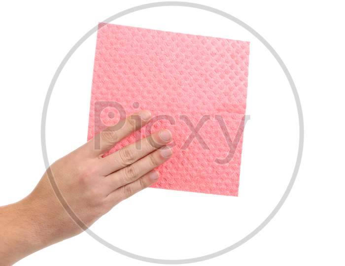 Hand Holds Pink Cleaning Sponge. Isolated On A White Background.