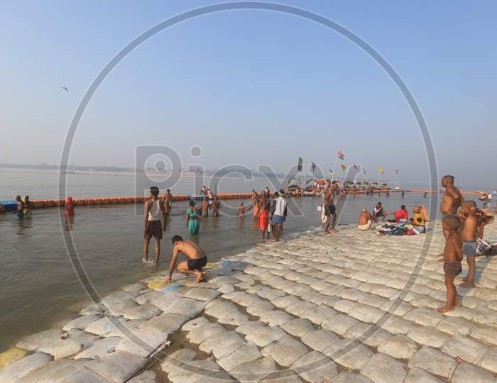 Devotees Taking Holy Bath In River Ganga At Prayagraj