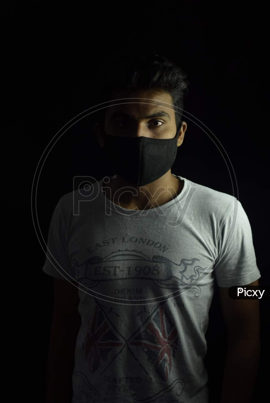 Portrait Of Indian Man Wearing Safety Mask Amidst Corona Virus or COVID 19  Outbreak in India