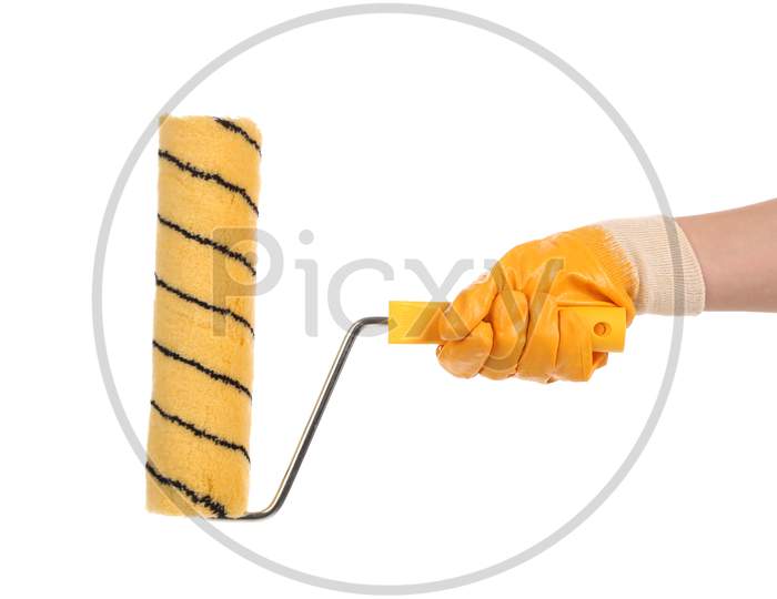 Hand With Paintbrush Roller. Isolated On A White Background.