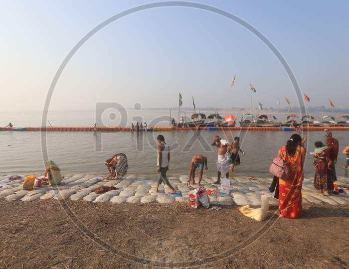 Devotees Taking Holy Bath In River Ganga At Prayagraj