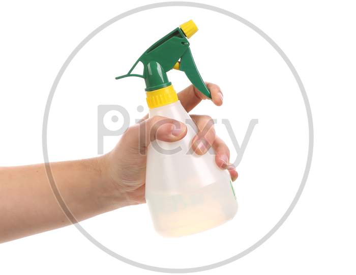 Hand Holding White Plastic Spray Bottle. Isolated On A White Background.