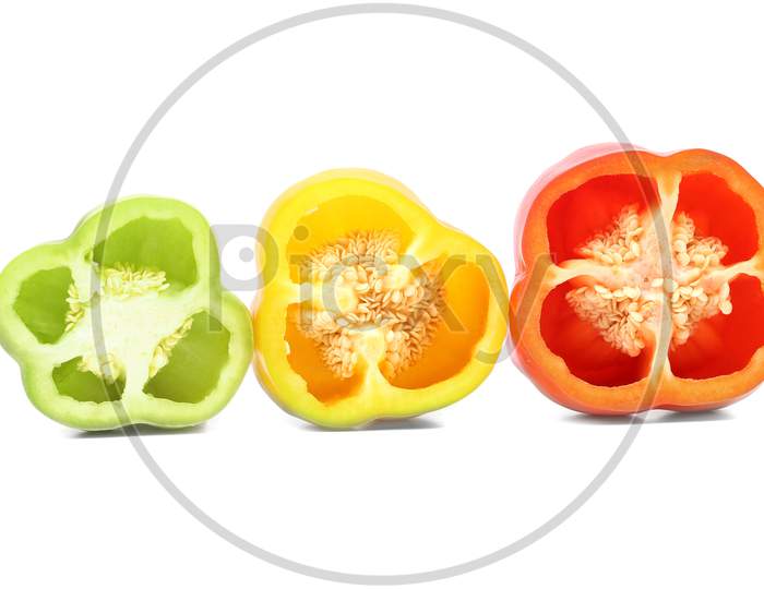 Three Half Of Bell Pepper. Isolated On A White Background.