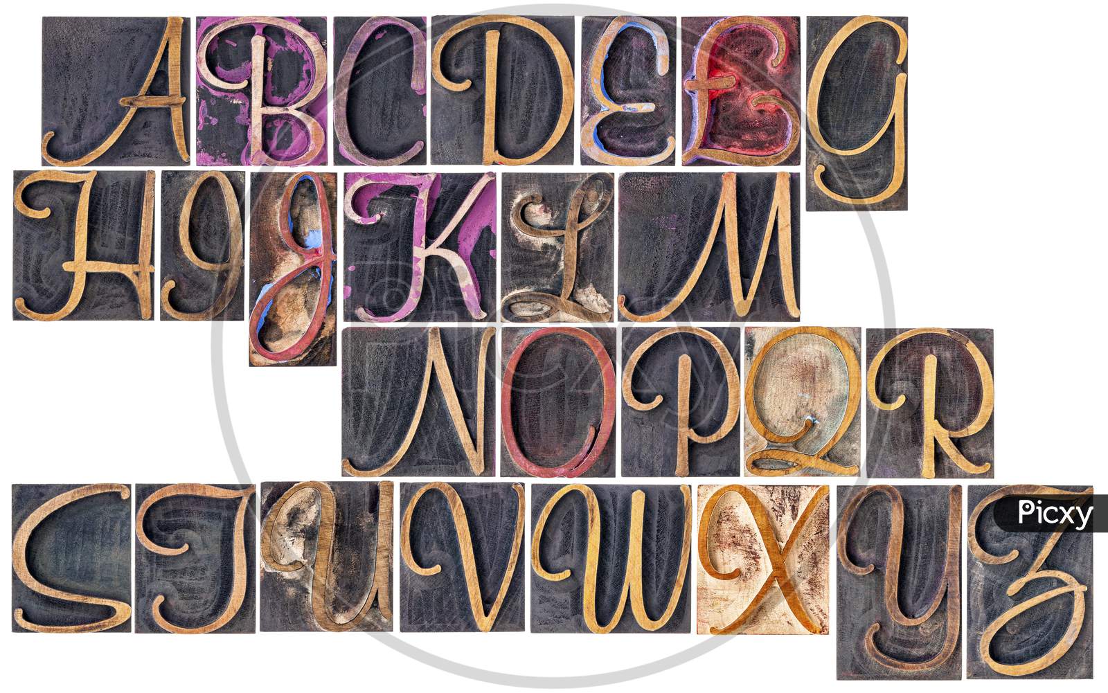 Complete English Alphabet  In Ornamental Script Wood Type - A  Collage Of 26 Isolated Letterpress Printing Blocks Stained By Color And Black Ink