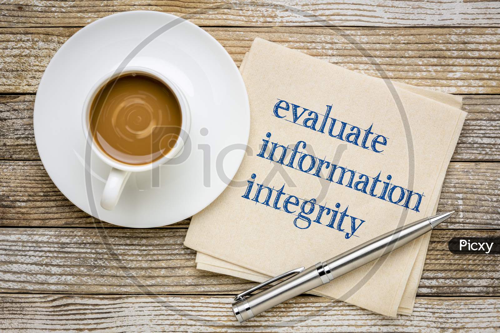 Evaluate Information Integrity Reminder - Handwriting On A Napkin With A Cup Of Coffee, Information Overload, Fake News And Infodemic Concept