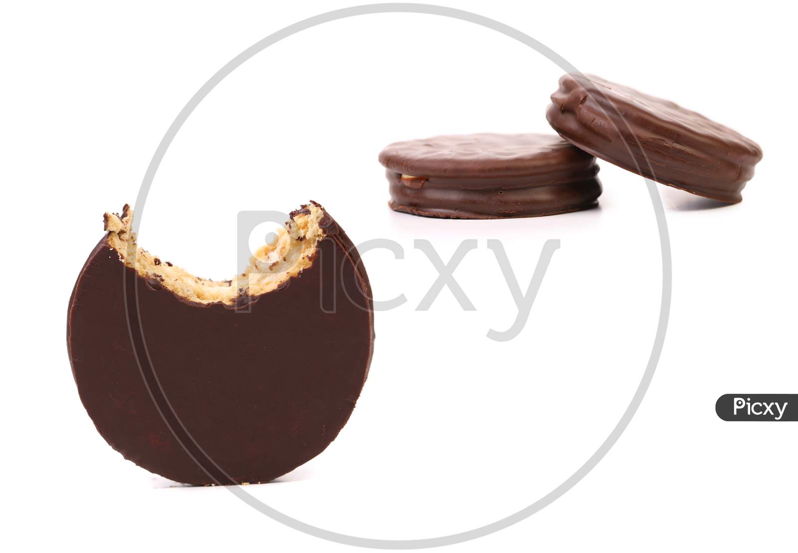 Stack Of Biscuit Sandwich With Chocolate. Isolated On A White Background.
