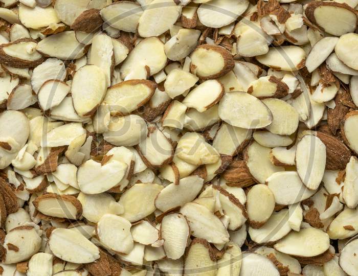 Raw Sliced Almond Nuts - Closeup Background