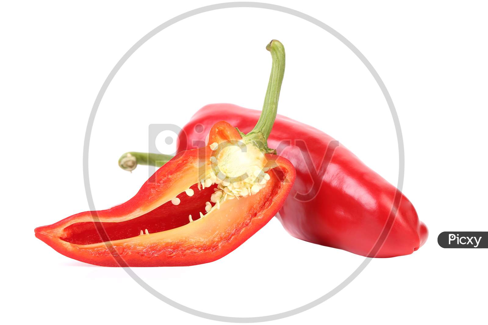 Red Pepper And Slice. Isolated On A White Background.