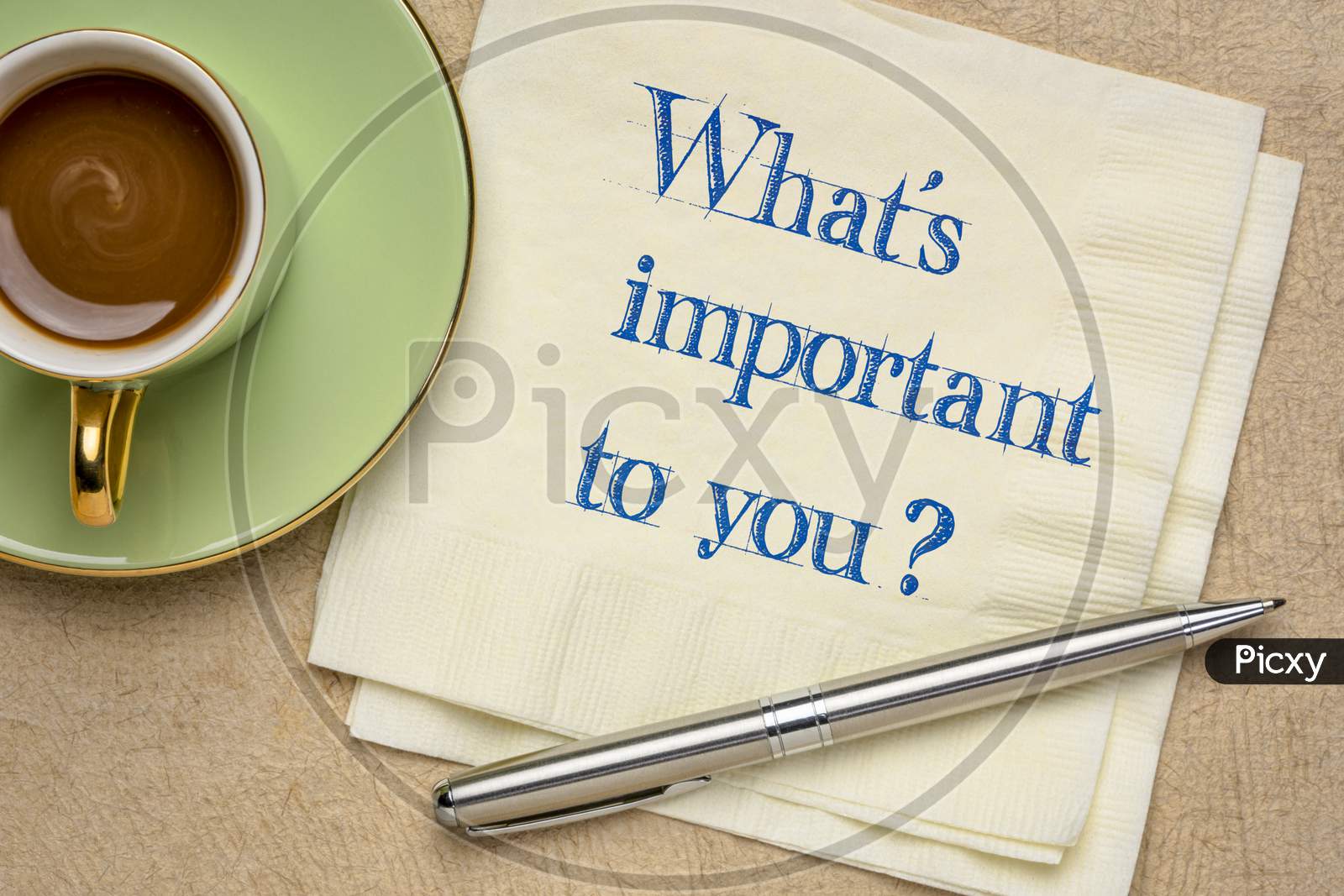 What Is Important To You? Handwriting On A Napkin With Coffee. Lifestyle, Career And Personal Development Concept.