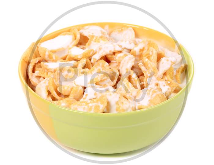 Bowl Of Sugar-Coated Corn Flakes With Milk. Isolated On A White Background.