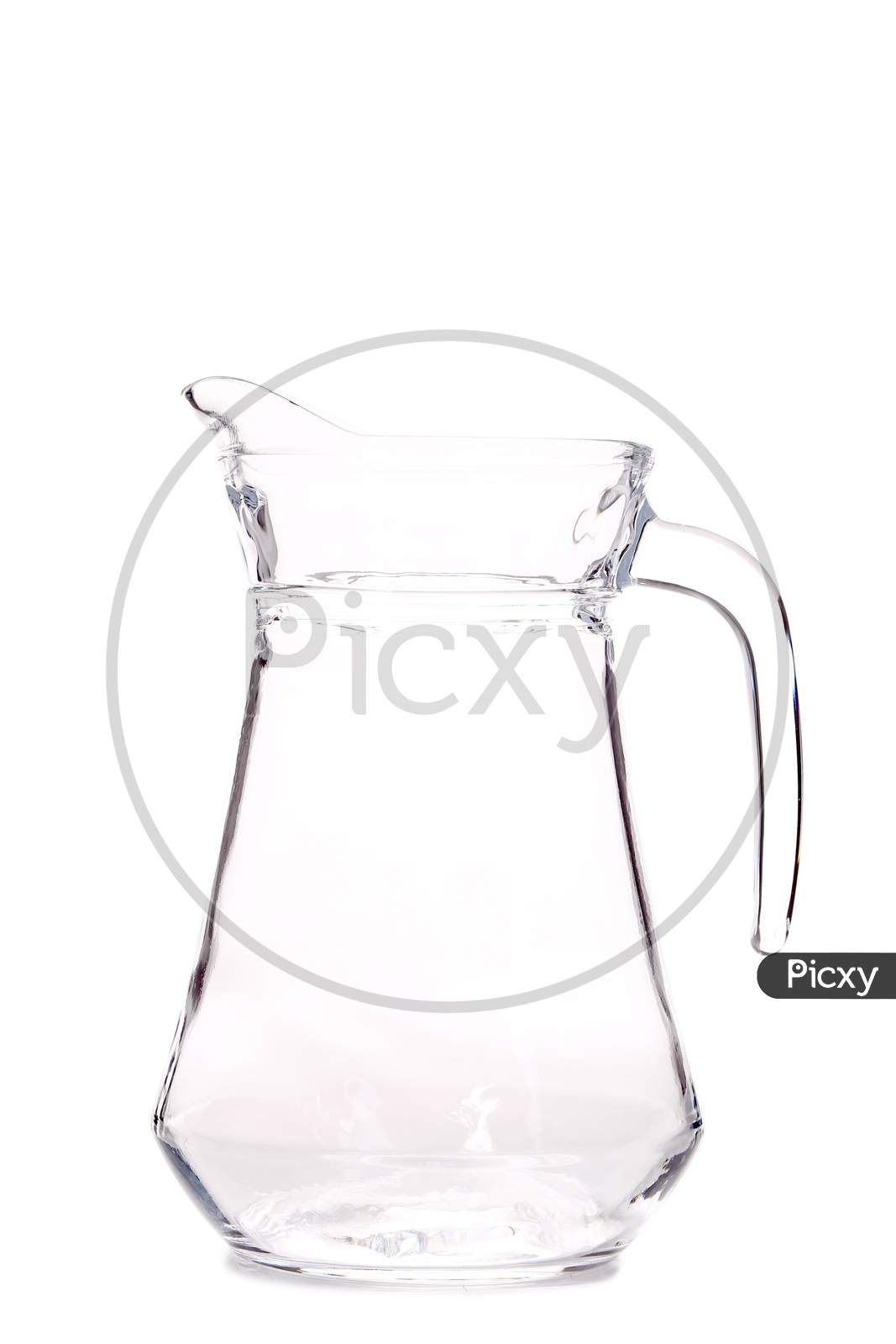 Close Up Of Glass Carafe. Isolated On White Background.