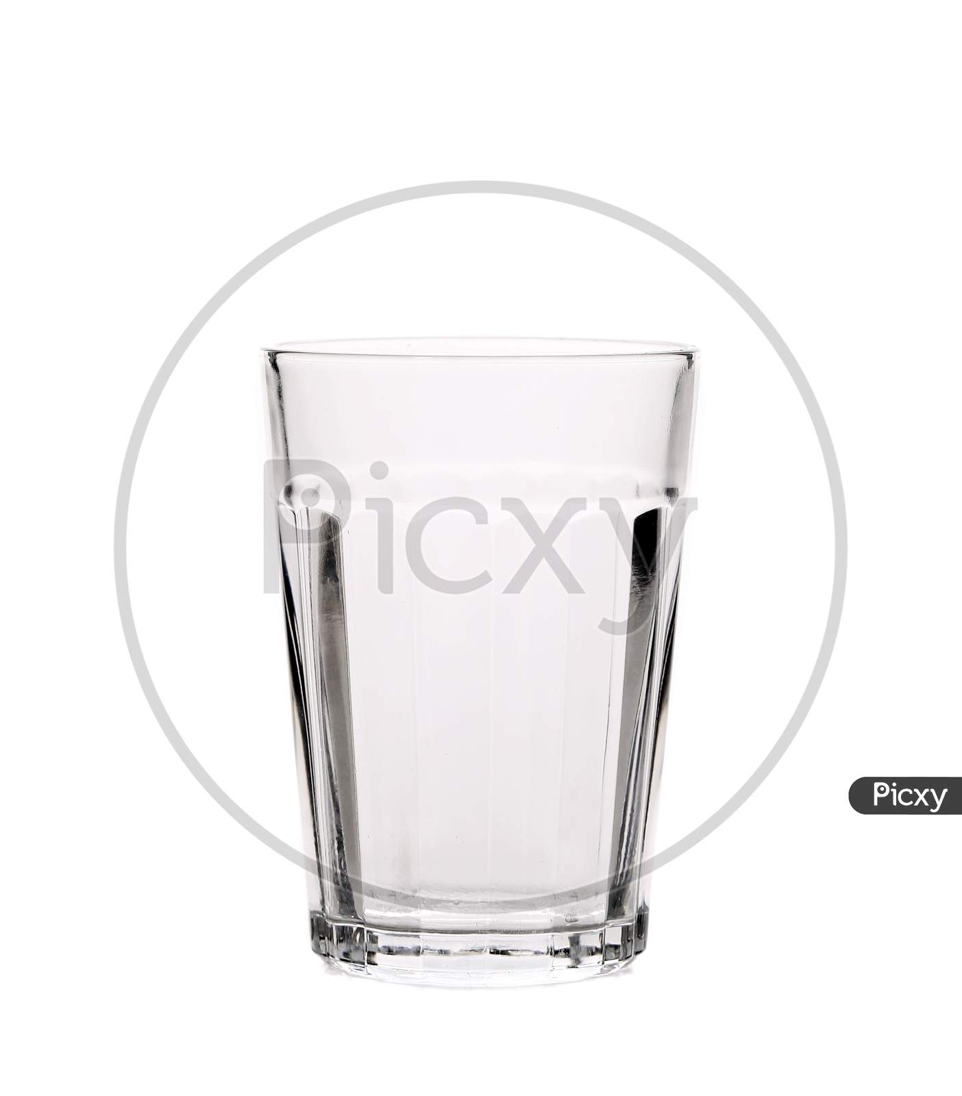 Close Up Of Faceted Empty Glass. Isolated On A White Background.
