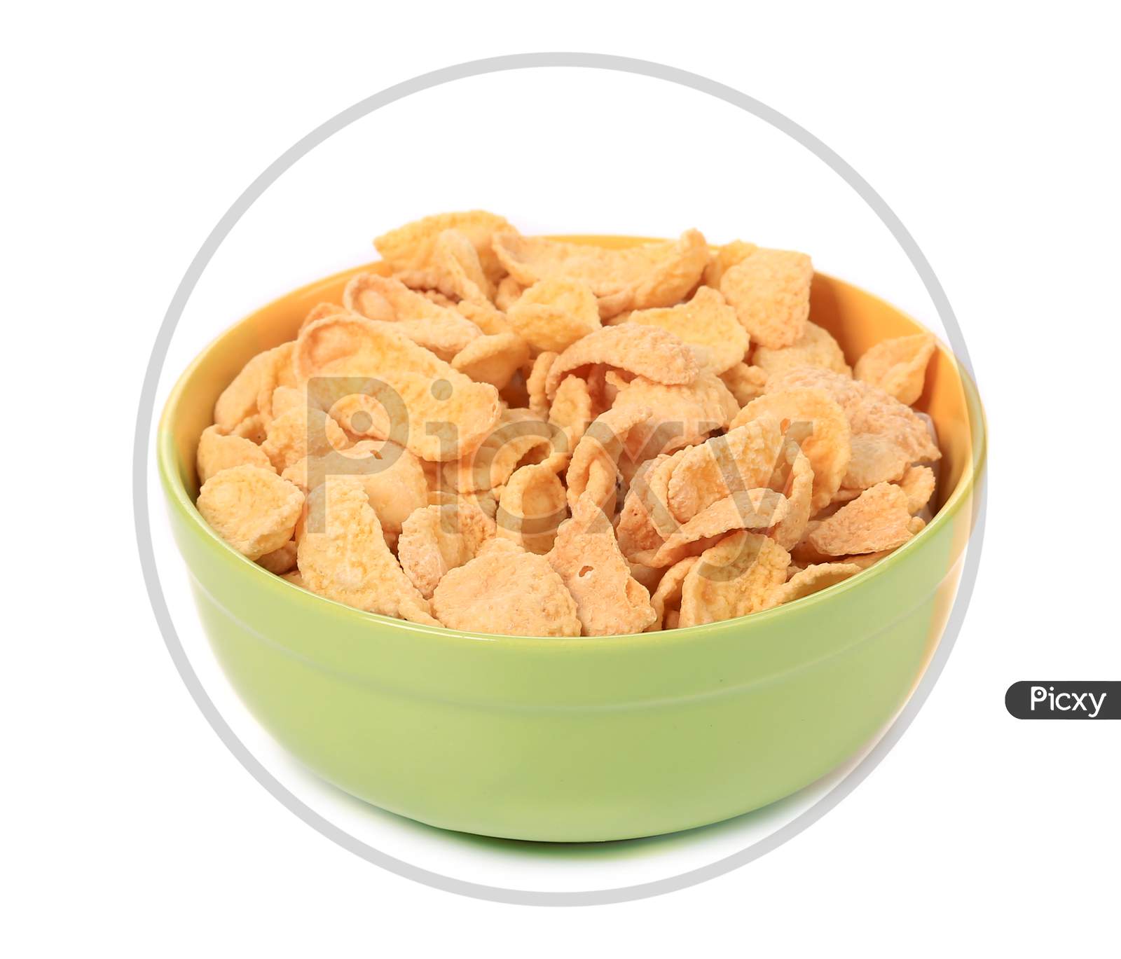 Bowl Of Sugar-Coated Corn Flakes. Isolated On A White Background.