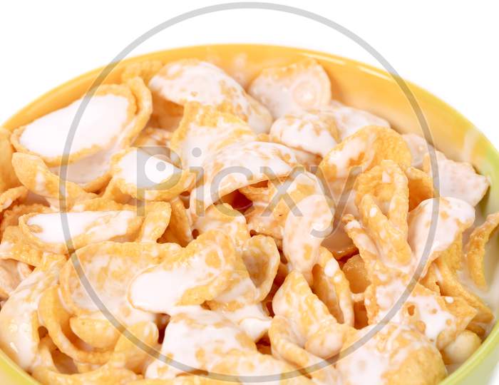 Close Up Of Corn Flakes With Milk. Whole Background.