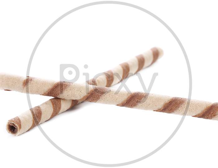Waffle Rolls With Chocolate Cream. Isolated On White Background