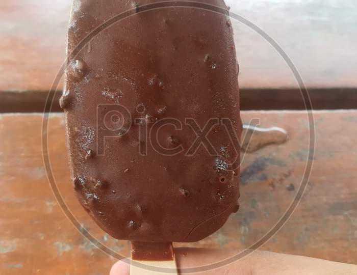 Chocolaty Chocobar in hand
