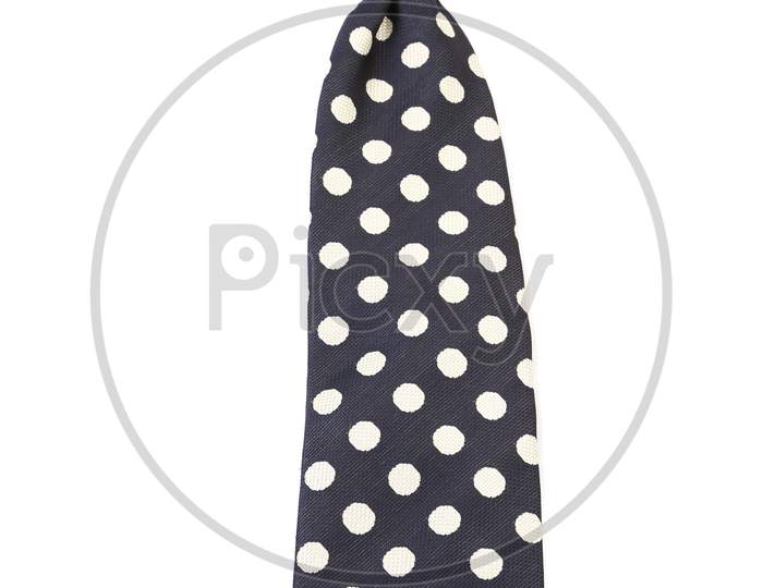Polka Dot Necktie. Vertical. Close Up.  Isolated On White Background