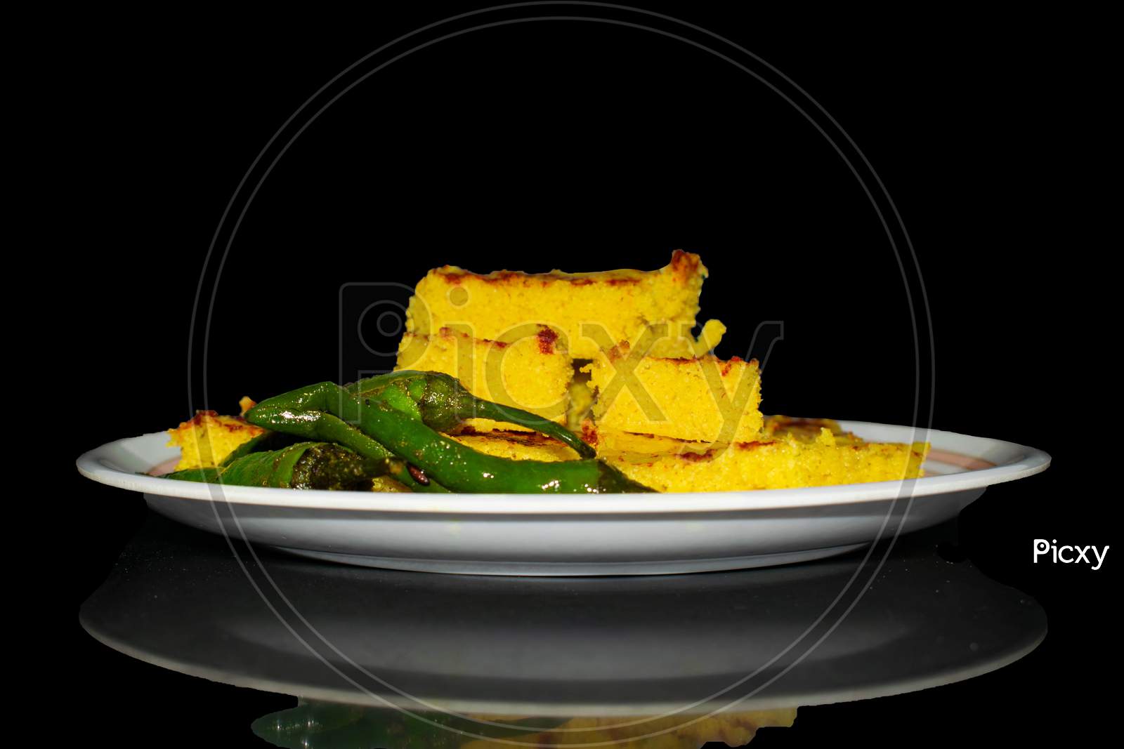 Khaman-Dhokla Indian breakfast, lunch and also dinner front view with shadow