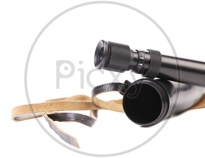 Black Cover And Spyglass Lying. Isolated On A White Background.