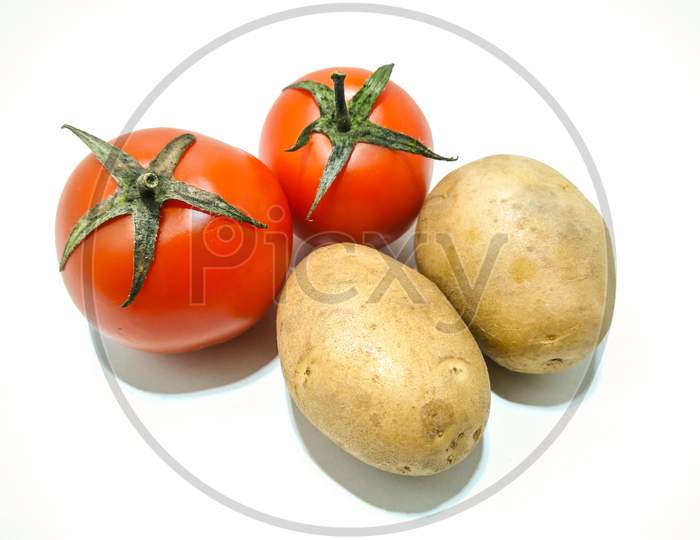 A picture of potato with tomato