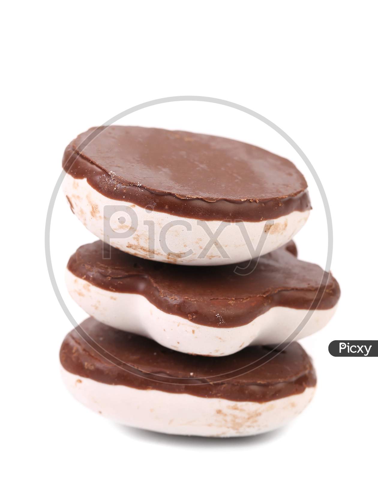 Stack Of White Kisses Cookies With Chocolate.  Isolated On White Background