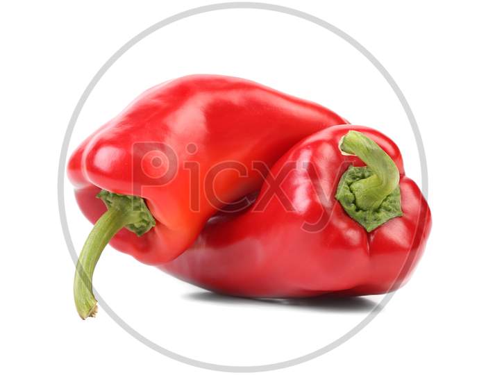 Two Red Sweet Pointy Pepper. Isolated On A White Background.
