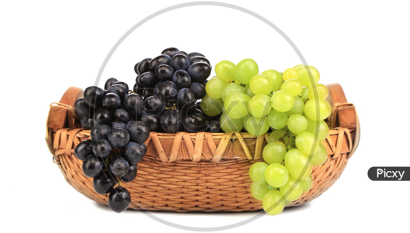 Black And Green Grapes In Basket. Isolated On A White Background.