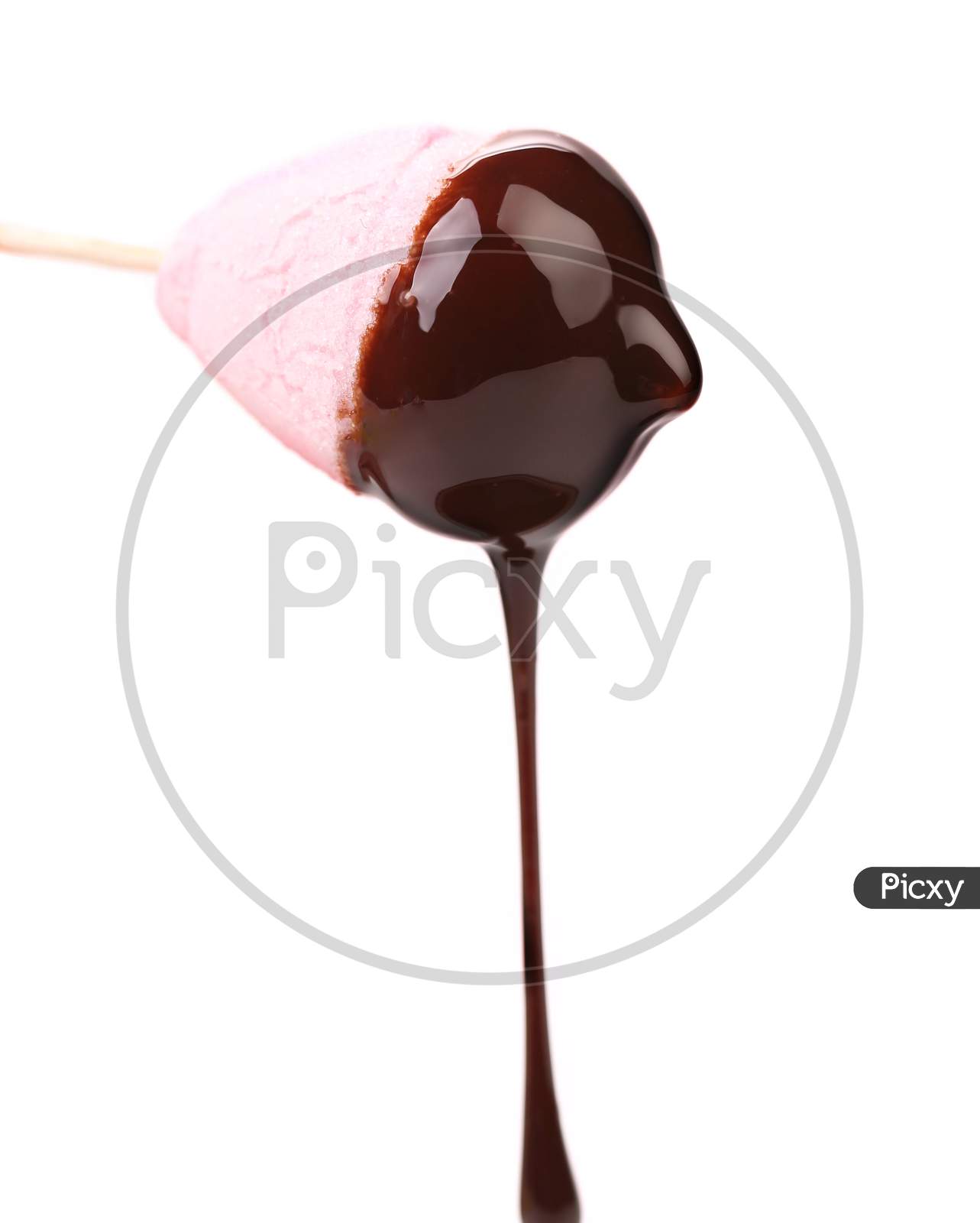 Marshmallow In Chocolate Syrop. Isolated. On A White Background
