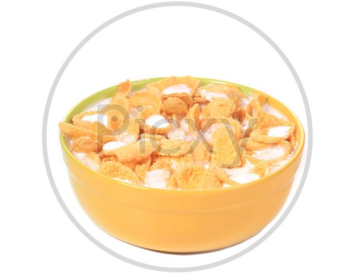 Bowl Of Corn Flakes With Milk Isolated On White Background