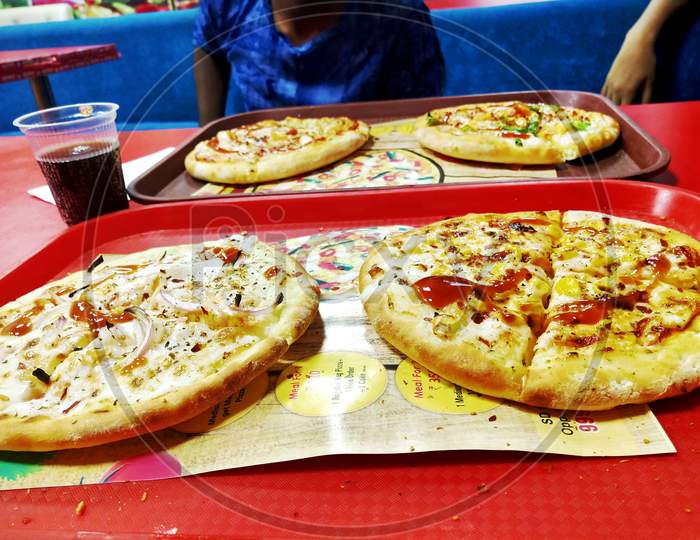 April 2019, Hisar, Haryana, India. Friends Eating Pizza Party Together Concept