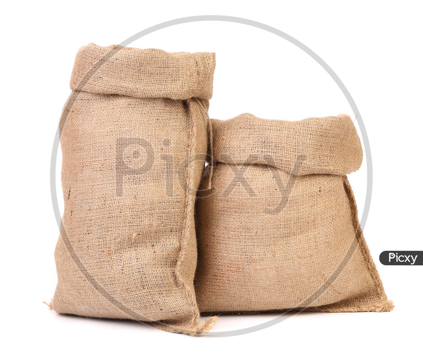 Two Open Bags From A Sacking. Isolated On A White Background