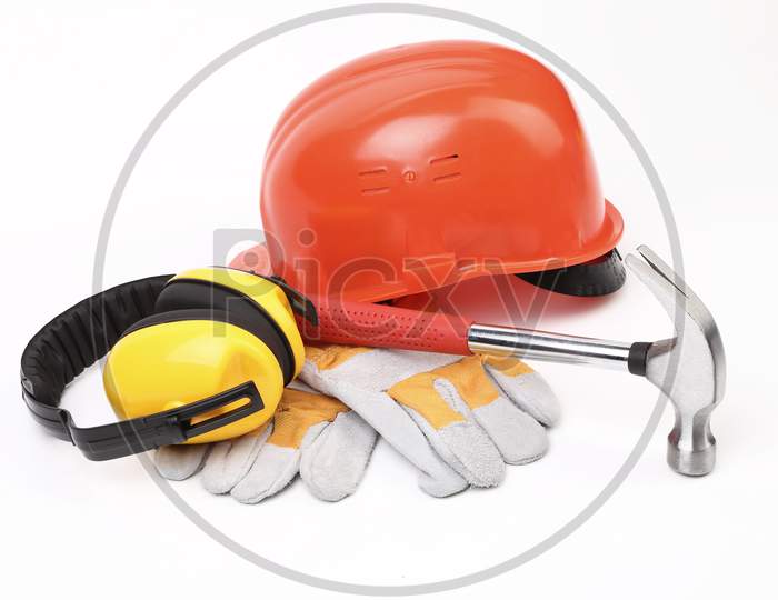 Red Hard Head Gloves And Tools. Isolated On A White Background