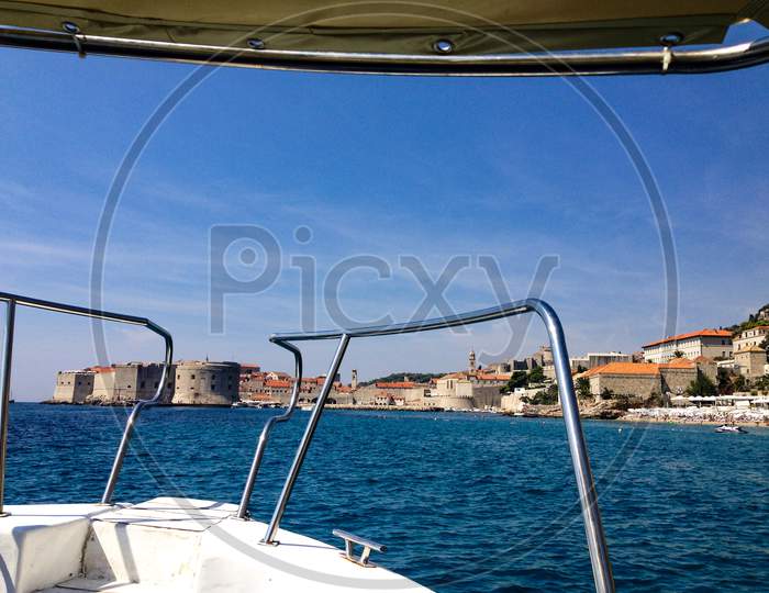 Seascape with Porporela and Old Town in Dubrovnik in the background.