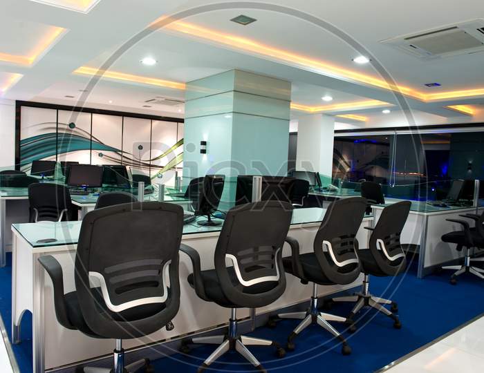 Office Interior With Chairs desks  And Computers