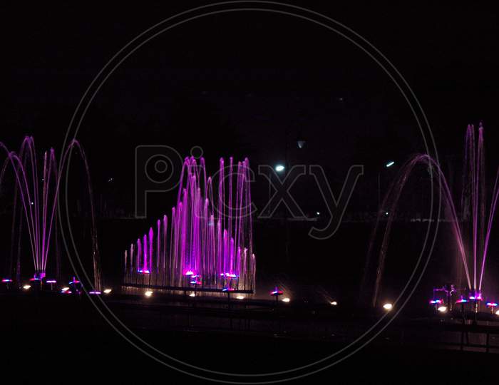 Musical fountain with colorful illuminations at night