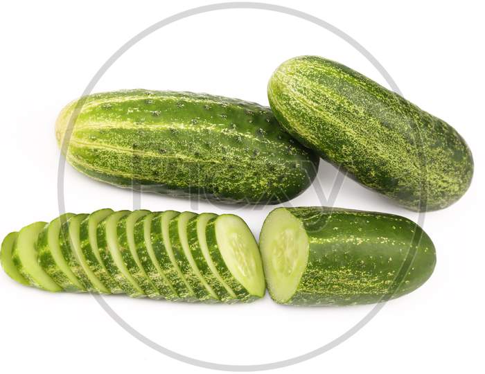 Fresh Cucumbers And Slices. Isolated On A White Background