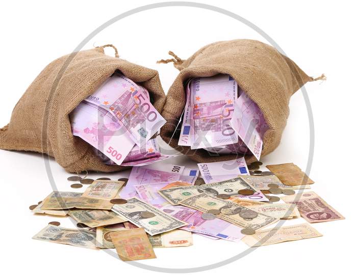 Two Bags With Much Money. Isolated On A White Background